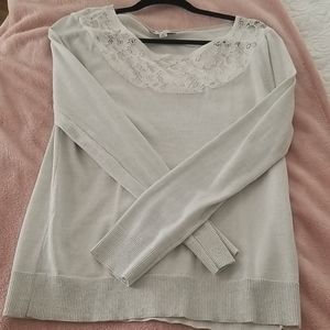 Black Rivet long sleeve sweater.